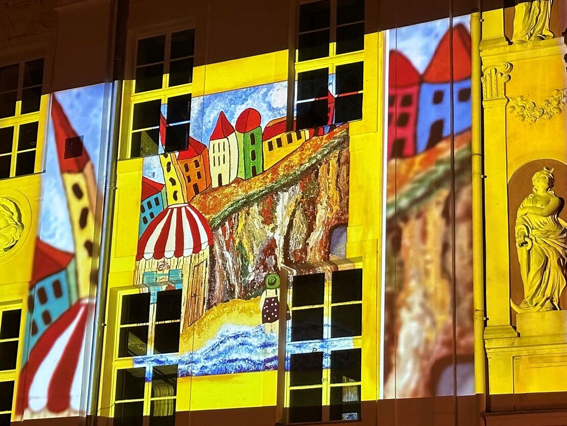 Kunstperformance Hausfassade